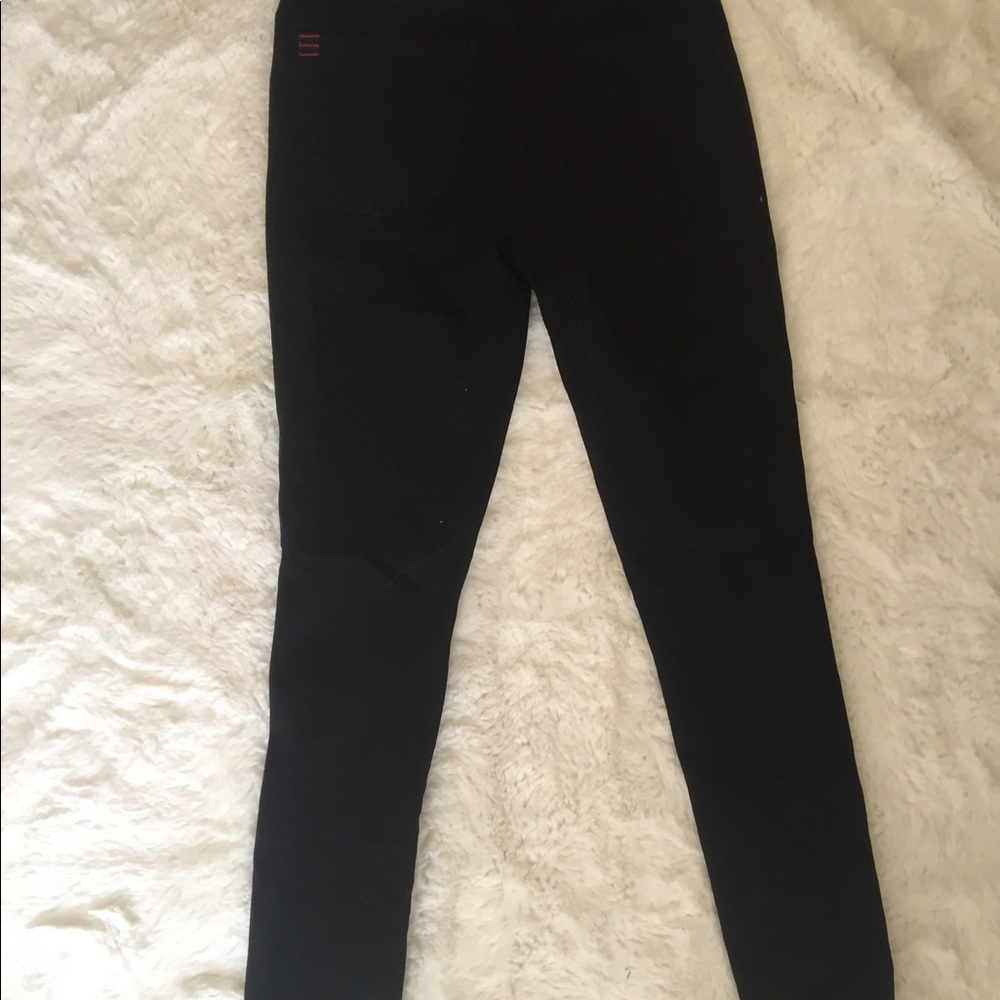 OU black skinny jeans
